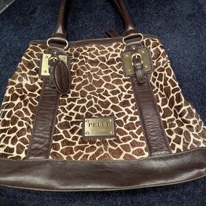 Pelle hair on hide bag
